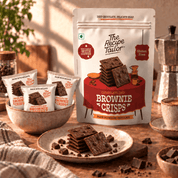 Chocolate Chip Brownie Crisps pouch and single packs with brownie crisps on a plate
