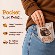 Pocket-sized Almond Chip Brownie Crisps pack in a jeans pocket