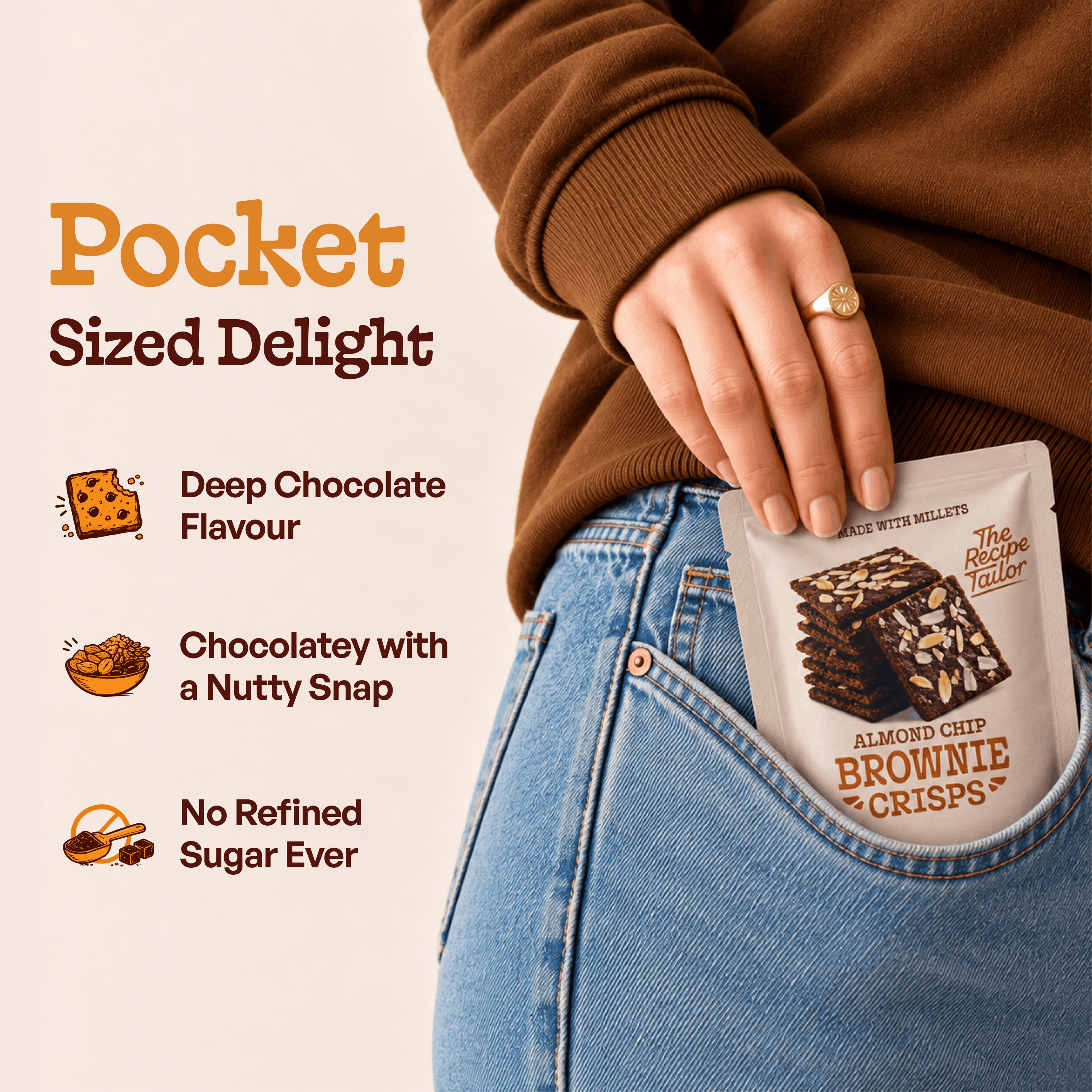 Pocket-sized Almond Chip Brownie Crisps pack in a jeans pocket